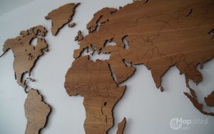 Wooden world map Oak country borders close up