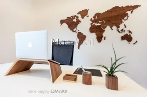 Magnetic American Walnut world map behind desk with red pin magnets