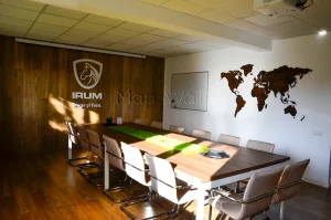 Magnetic wooden world map installed in a meeting room